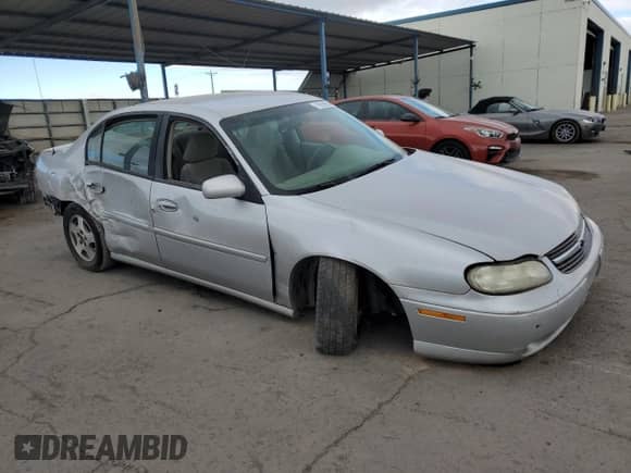 2003 Chevrolet Malibu LS with VIN 1G1NE52J23M633082, listed as a Copart auction lot 79299664 with 149,574 mi miles and Salvage title. Bid and sale history available at DreamBid. Image 4.