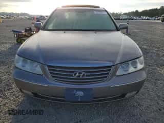 2006 Hyundai Azera SE z VIN KMHFC46F26A133300, wystawiony jako Copart lot #74730624 z przebiegiem 100 963 mil mil oraz Szkoda całkowita • Salvage title. Historia ofert i sprzedaży dostępna na DreamBid. Obrazek 5.