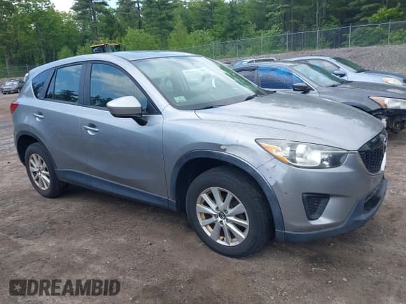 ✅ 2014 Mazda CX-5 Sport • VIN: JM3KE2BEXE0322870 • Lot: 42352920. Listed on IAAI with 368,209 mi. Free auction sales archive from the USA and detailed vehicle history report at DreamBid. Image 12.