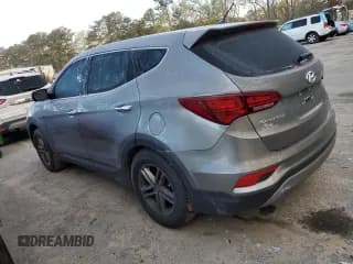 ✅ 2018 Hyundai Santa Fe 2.4L • VIN: 5XYZTDLB0JG562768 • Лот: 45202753. Опубликован ранее на Copart с пробегом Не указан. Бесплатный доступ к архиву аукционных продаж из США и подробный отчёт об истории автомобиля на DreamBid. Изображение 2.