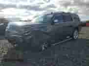 2020 Chevrolet Tahoe Premier with VIN 1GNSKCKJ0LR101198, listed as a Copart auction lot 84955895 with 99,414 mi miles and Salvage title. Bid and sale history available at DreamBid. Image 1.