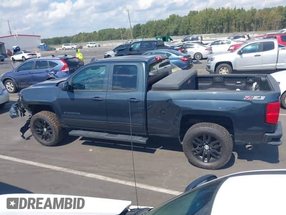2017 Chevrolet Silverado 1500 LT with VIN 1GCVKREC6HZ229846, listed as a IAAI auction lot 43298428 with 86,125 mi miles and . Bid and sale history available at DreamBid. Image 14.