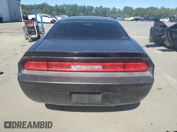 ✅ 2012 Dodge Challenger SXT Plus • VIN: 2C3CDYAG5CH170371 • Lot: 87419365. Wystawiony na Copart z przebiegiem 112 622 mil. Bezpłatny archiwum sprzedaży aukcyjnych z USA i szczegółowy raport historii pojazdu na DreamBid. Zdjęcie 6.