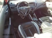 ✅ 2013 Hyundai Veloster Turbo • VIN: KMHTC6AE6DU162758 • Lot: 42955215. Wystawiony na Copart z przebiegiem 120 660 mil. Bezpłatny archiwum sprzedaży aukcyjnych z USA i szczegółowy raport historii pojazdu na DreamBid. Zdjęcie 8.