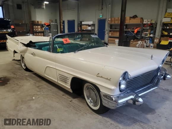 ✅ 1960 Lincoln Continental • VIN: 0Y85H401657 • Лот: 91448235. Опубликован ранее на Copart с пробегом 98 488 миль. Бесплатный доступ к архиву аукционных продаж из США и подробный отчёт об истории автомобиля на DreamBid. Изображение 4.