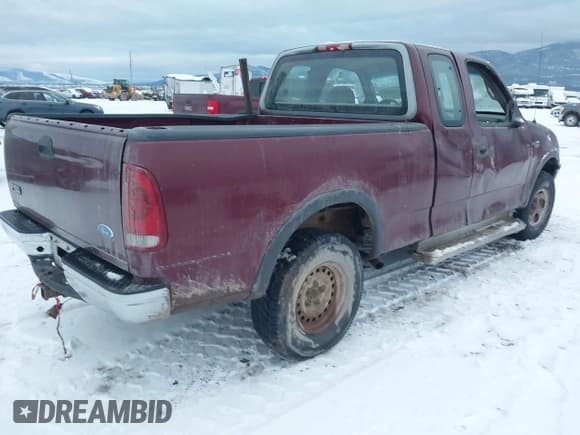 ✅ 1997 Ford F-150 • VIN: 2FTDX18W1VCA70148 • Lot: 43816189. Listed on IAAI with 165,055 mi. Free auction sales archive from the USA and detailed vehicle history report at DreamBid. Image 4.