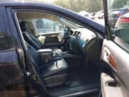 ✅ 2015 Nissan Pathfinder Platinum • VIN: 5N1AR2MM7FC707876 • Lot: 42255193. Listed on IAAI with 144,051 mi. Free auction sales archive from the USA and detailed vehicle history report at DreamBid. Image 5.