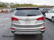 ✅ 2018 Hyundai Santa Fe 2.4L • VIN: 5NMZTDLB2JH095519 • Лот: 43462708. Опубликован ранее на IAAI с пробегом 87 498 миль. Бесплатный доступ к архиву аукционных продаж из США и подробный отчёт об истории автомобиля на DreamBid. Изображение 16.