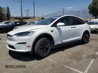 ✅ 2023 Tesla Model X • VIN: 7SAXCBE52PF417849 • Lot: 63702015. Wystawiony na Copart z przebiegiem 35 357 mil. Bezpłatny archiwum sprzedaży aukcyjnych z USA i szczegółowy raport historii pojazdu na DreamBid. Zdjęcie 1.