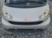 ✅ 2008 Smart fortwo Passion • VIN: WMEEK31X78K187980 • Лот: 62650235. Опубликован ранее на Copart с пробегом Не указан. Бесплатный доступ к архиву аукционных продаж из США и подробный отчёт об истории автомобиля на DreamBid. Изображение 11.