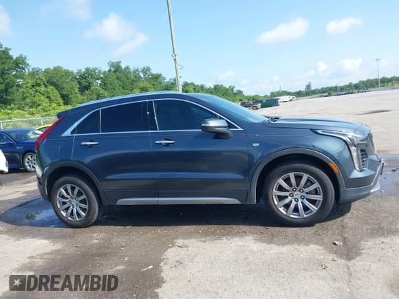 ✅ 2021 Cadillac XT4 FWD Premium Luxury • VIN: 1GYFZCR42MF007617 • Лот: 42437974. Опубликован ранее на IAAI с пробегом 126 071 миль. Бесплатный доступ к архиву аукционных продаж из США и подробный отчёт об истории автомобиля на DreamBid. Изображение 13.