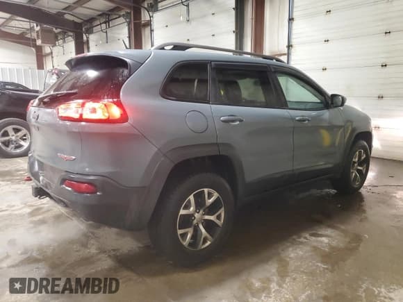 ✅ 2014 Jeep Cherokee Trailhawk • VIN: 1C4PJMBS8EW150380 • Lot: 92049015. Listed on Copart with 90,306 mi. Free auction sales archive from the USA and detailed vehicle history report at DreamBid. Image 3.