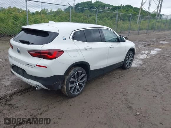 ✅ 2021 BMW X2 sDrive28i • VIN: WBXYH9C04M5S75877 • Lot: 42371292. Listed on IAAI with 55,945 mi. Free auction sales archive from the USA and detailed vehicle history report at DreamBid. Image 4.