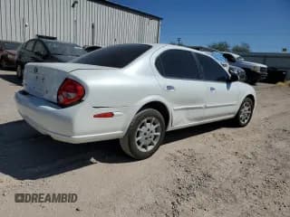 ✅ 2000 Nissan Maxima GXE • VIN: JN1CA31D1YT531301 • Lot: 72937434. Listed on Copart with Not provided. Free auction sales archive from the USA and detailed vehicle history report at DreamBid. Image 3.