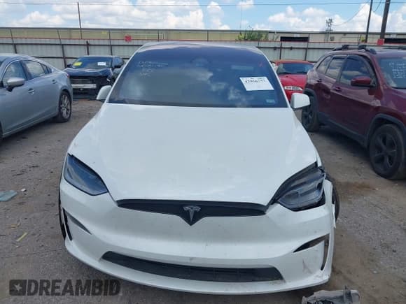✅ 2023 Tesla Model X Plaid • VIN: 7SAXCBE65PF418602 • Lot: 42956757. Listed on IAAI with 44,161 mi. Free auction sales archive from the USA and detailed vehicle history report at DreamBid. Image 11.
