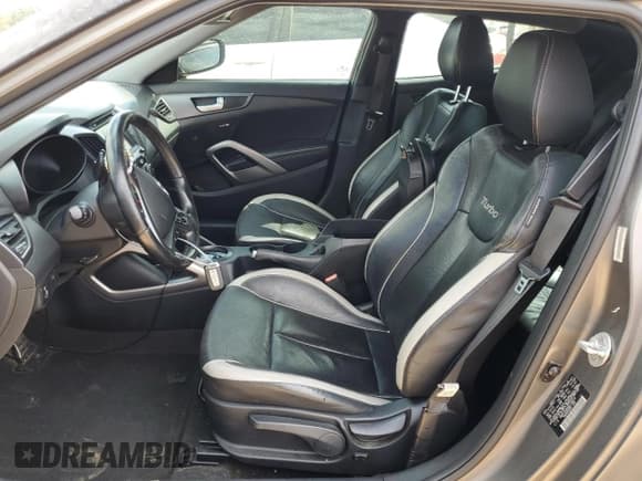 ✅ 2013 Hyundai Veloster Turbo • VIN: KMHTC6AE4DU156618 • Lot: 74522134. Wystawiony na Copart z przebiegiem 149 026 mil. Bezpłatny archiwum sprzedaży aukcyjnych z USA i szczegółowy raport historii pojazdu na DreamBid. Zdjęcie 7.