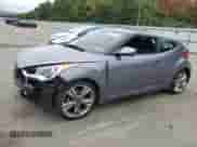 2016 Hyundai Veloster z VIN KMHTC6ADXGU252488, wystawiony jako Copart lot #65415583 z przebiegiem 53 482 mil mil oraz . Historia ofert i sprzedaży dostępna na DreamBid. Obrazek 1.