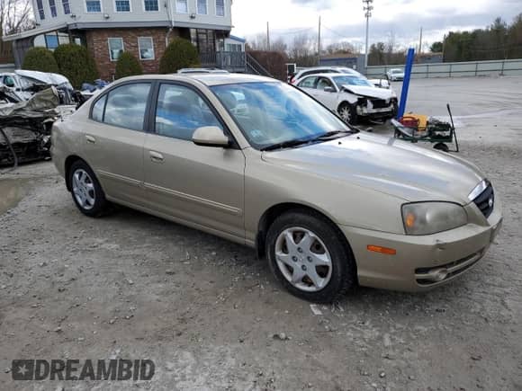 2003 Hyundai Elantra GLS z VIN KMHDN46D26U345516, wystawiony jako Copart lot #82101734 z przebiegiem 41 782 mil mil oraz Czysty tytuł • Clean title. Historia ofert i sprzedaży dostępna na DreamBid. Obrazek 4.