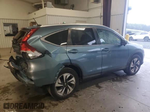 ✅ 2015 Honda CR-V Touring • VIN: 5J6RM3H9XFL020337 • Lot: 81793395. Listed on Copart with 141,448 mi. Free auction sales archive from the USA and detailed vehicle history report at DreamBid. Image 3.