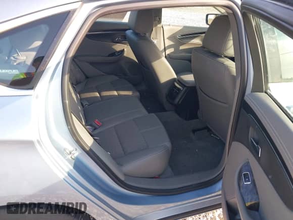 2015 Chevrolet Impala LT with VIN 1G1125S36FU100682, listed as a IAAI auction lot 43003210 with 76,563 mi miles and . Bid and sale history available at DreamBid. Image 8.