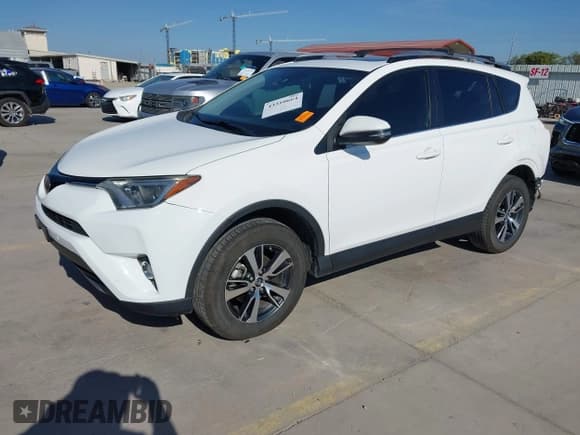 ✅ 2018 Toyota RAV4 XLE • VIN: JTMWFREV2JD132897 • Lot: 43310664. Listed on IAAI with 96,612 mi. Free auction sales archive from the USA and detailed vehicle history report at DreamBid. Image 18.