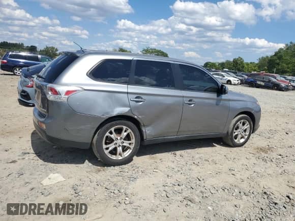 2014 Mitsubishi Outlander SE with VIN JA4AD3A38EZ012753, listed as a Copart auction lot 69844145 with 138,240 mi miles and Salvage title. Bid and sale history available at DreamBid. Image 3.