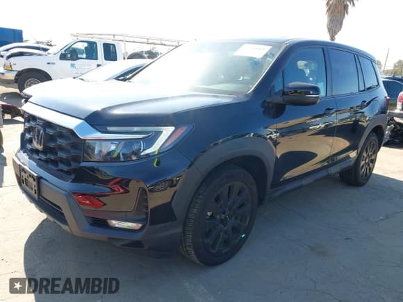 ✅ 2022 Honda Passport EX-L • VIN: 5FNYF7H57NB006607 • Lot: 42856801. Listed on IAAI with 29,366 mi. Free auction sales archive from the USA and detailed vehicle history report at DreamBid. Image 2.