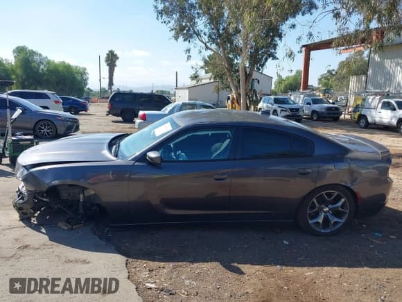 ✅ 2015 Dodge Charger SXT • VIN: 2C3CDXHG5FH825469 • Lot: 43511613. Listed on IAAI with 97,272 mi. Free auction sales archive from the USA and detailed vehicle history report at DreamBid. Image 15.