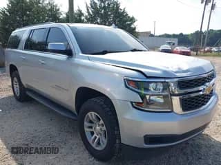 2020 Chevrolet Suburban LT z VIN 1GNSKHKCXLR258283, wystawiony jako IAAI lot #42735336 z przebiegiem 178 697 mil mil oraz . Historia ofert i sprzedaży dostępna na DreamBid. Obrazek 1.