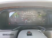 ✅ 1999 Lincoln Town Car Signature • VIN: 1LNHM82W9XY691057 • Lot: 90223875. Listed on Copart with 200,691 mi. Free auction sales archive from the USA and detailed vehicle history report at DreamBid. Image 9.