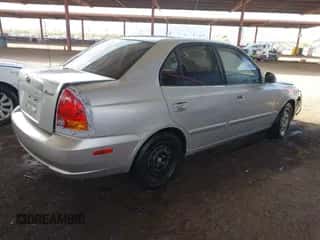 2003 Hyundai Accent GL z VIN KMHCG45C93U476176, wystawiony jako IAAI lot #41940608 z przebiegiem 212 264 mil mil oraz . Historia ofert i sprzedaży dostępna na DreamBid. Obrazek 4.