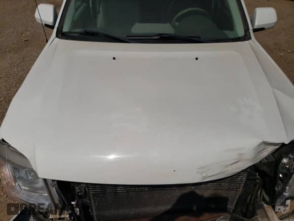 2010 Mercury Mariner Premier с VIN 4M2CN9H72AKJ24775, выставлен на аукционе Copart как лот 65381985 с пробегом 162 621 миль миль и Списание • Salvage title. История ставок и продаж доступна на DreamBid. Изображение 11.