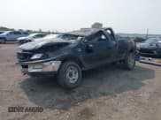 ✅ 1998 Ford F-150 XL • VIN: 1FTRX08L5WKC13654 • Lot: 42402628. Listed on IAAI with 128,541 mi. Free auction sales archive from the USA and detailed vehicle history report at DreamBid. Image 2.