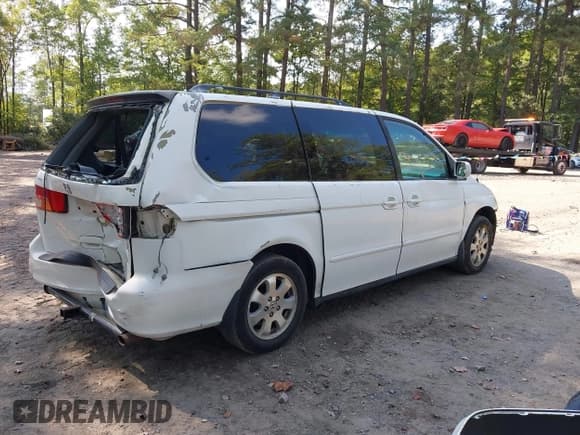 ✅ 2004 Honda Odyssey EX-L • VIN: 5FNRL18924B078634 • Lot: 43310529. Listed on IAAI with 249,022 mi. Free auction sales archive from the USA and detailed vehicle history report at DreamBid. Image 4.