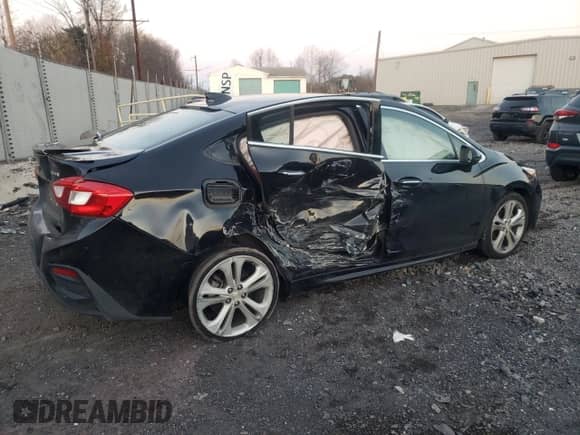 ✅ 2016 Chevrolet Cruze Premier • VIN: 1G1BG5SMXG7236764 • Лот: 68163882. Размещён на Copart с пробегом 51 594 миль миль. Получите бесплатный доступ к архиву аукционных продаж из США и посмотрите подробный отчёт об истории автомобиля на DreamBid. Изображение 3.