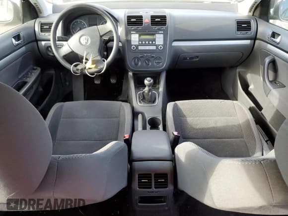 ✅ 2009 Volkswagen Jetta S • VIN: 3VWHZ71KX9M011693 • Лот: 87076904. Опубликован ранее на Copart с пробегом 157 478 миль. Бесплатный доступ к архиву аукционных продаж из США и подробный отчёт об истории автомобиля на DreamBid. Изображение 8.