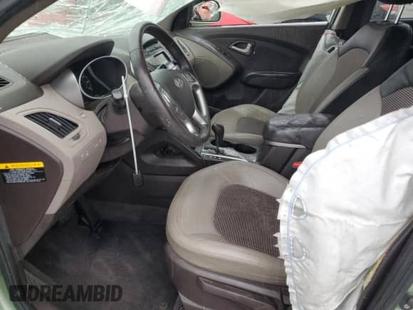 2013 Hyundai Tucson GLS z VIN KM8JU3AC4DU546815, wystawiony jako Copart lot #60543454 z przebiegiem 158 613 mil mil oraz Szkoda całkowita • Salvage title. Historia ofert i sprzedaży dostępna na DreamBid. Obrazek 7.