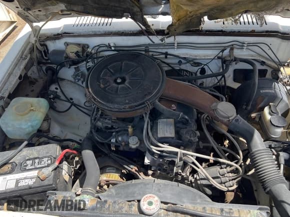 ✅ 1984 Datsun 720 • VIN: JN6ND01S5EX276292 • Lot: 66215945. Wystawiony na Copart z przebiegiem 101 732 mil. Bezpłatny archiwum sprzedaży aukcyjnych z USA i szczegółowy raport historii pojazdu na DreamBid. Zdjęcie 7.