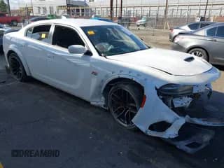 2020 Dodge Charger Scat Pack with VIN 2C3CDXGJ5LH160551, listed as a IAAI auction lot 43372982 with 45,141 mi miles and . Bid and sale history available at DreamBid. Image 1.