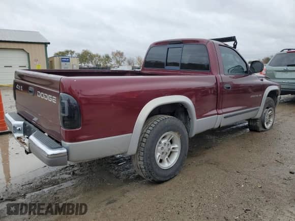 2000 Dodge Dakota Sport z VIN 1B7GG26N8YS795890, wystawiony jako Copart lot #78523764 z przebiegiem 214 933 mil mil oraz Szkoda całkowita • Salvage title. Historia ofert i sprzedaży dostępna na DreamBid. Obrazek 3.