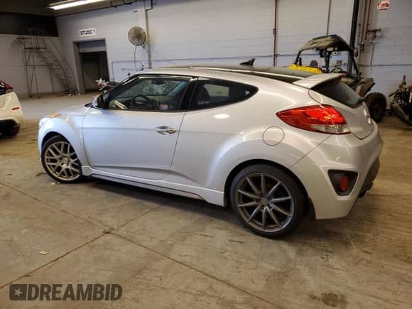 2015 Hyundai Veloster Turbo z VIN KMHTC6AE7FU217009, wystawiony jako Copart lot #54580164 z przebiegiem 82 008 mil mil oraz . Historia ofert i sprzedaży dostępna na DreamBid. Obrazek 2.
