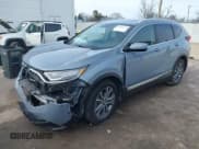 ✅ 2022 Honda CR-V Touring • VIN: 7FARW2H92NE021336 • Lot: 41846672. Listed on IAAI with Not provided. Free auction sales archive from the USA and detailed vehicle history report at DreamBid. Image 2.