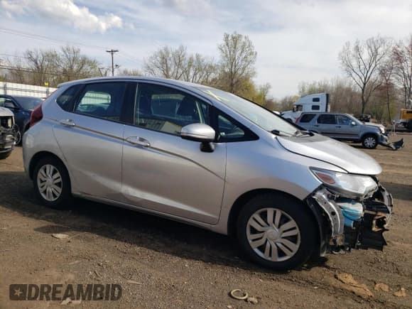✅ 2015 Honda Fit LX • VIN: 3HGGK5G56FM711135 • Lot: 53340805. Listed on Copart with 131,929 mi. Free auction sales archive from the USA and detailed vehicle history report at DreamBid. Image 4.