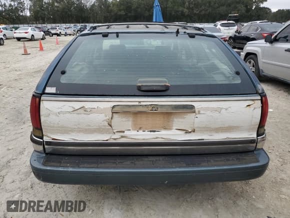 ✅ 1994 Buick Roadmaster • VIN: 1G4BR8374PW401964 • Lot: 86082234. Listed on Copart with 243,527 mi. Free auction sales archive from the USA and detailed vehicle history report at DreamBid. Image 6.