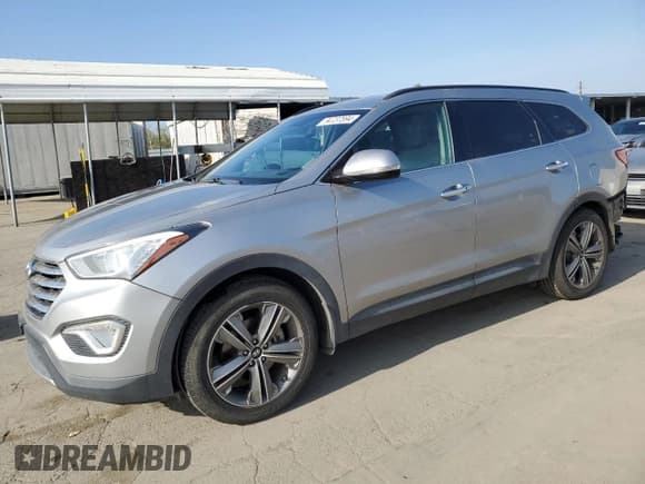 ✅ 2015 Hyundai Santa Fe Limited • VIN: KM8SN4HF6FU112034 • Лот: 84737894. Опубликован ранее на Copart с пробегом 168 581 миль. Бесплатный доступ к архиву аукционных продаж из США и подробный отчёт об истории автомобиля на DreamBid. Изображение 1.