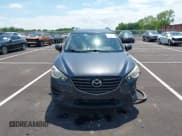 ✅ 2016 Mazda CX-5 Sport • VIN: JM3KE4BY4G0783619 • Lot: 42368512. Listed on IAAI with 115,694 mi. Free auction sales archive from the USA and detailed vehicle history report at DreamBid. Image 12.