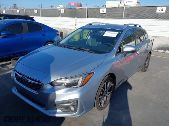 ✅ 2018 Subaru Impreza Limited • VIN: 4S3GTAU61J3744863 • Lot: 43401602. Listed on IAAI with 166,070 mi. Free auction sales archive from the USA and detailed vehicle history report at DreamBid. Image 2.