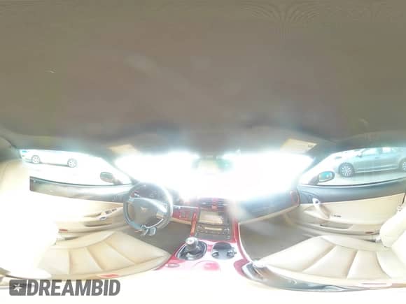 2006 Chevrolet Corvette with VIN 1G1YY26U765120707, listed as a Copart auction lot 85285404 with 126,231 mi miles and Salvage title. Bid and sale history available at DreamBid. Image 13.