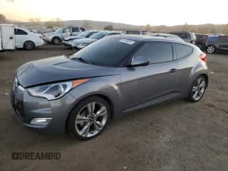 ✅ 2017 Hyundai Veloster • VIN: KMHTC6AD8HU313922 • Lot: 84196834. Wystawiony na Copart z przebiegiem 93 305 mil. Bezpłatny archiwum sprzedaży aukcyjnych z USA i szczegółowy raport historii pojazdu na DreamBid. Zdjęcie 1.