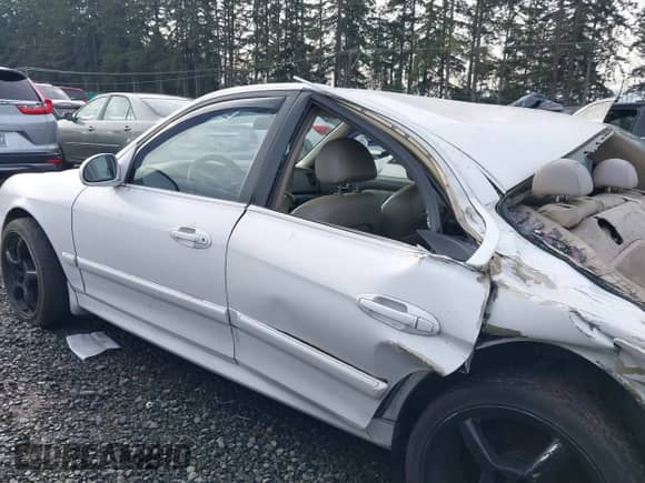 2004 Hyundai Sonata GLS with VIN KMHWF35H94A014600, listed as a IAAI auction lot 41031062 with 128,512 mi miles and . Bid and sale history available at DreamBid. Image 14.